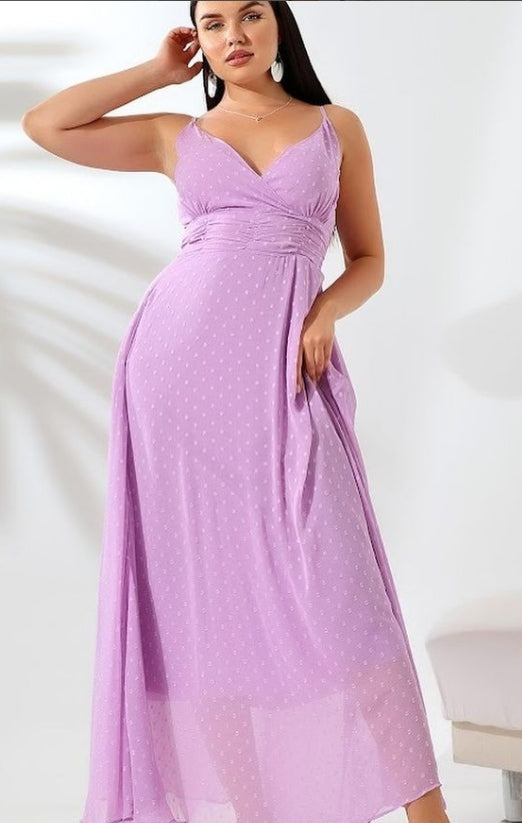 maxi dress with a flowy, ethereal design.