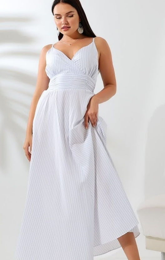 maxi dress with a flowy, ethereal design.